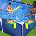 Thickened above ground pool storage basket hanging on a framed pool 9